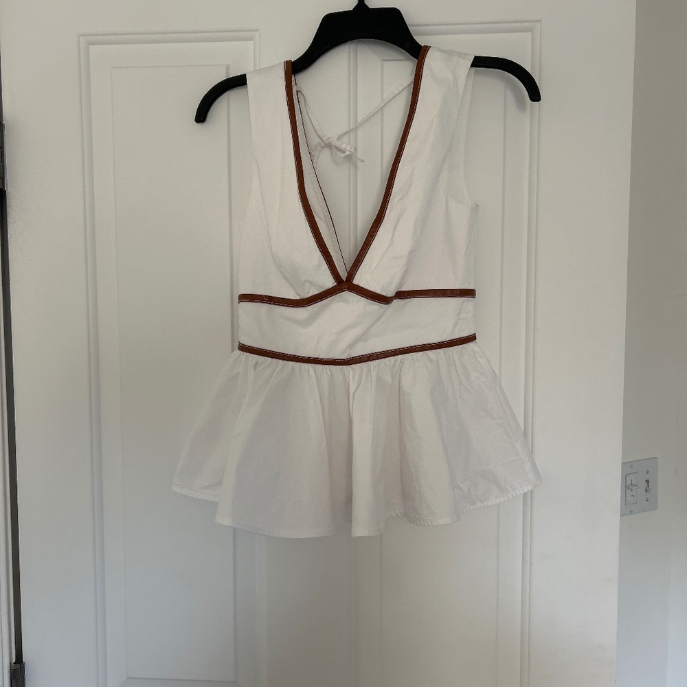 White peplum low v in front and back top